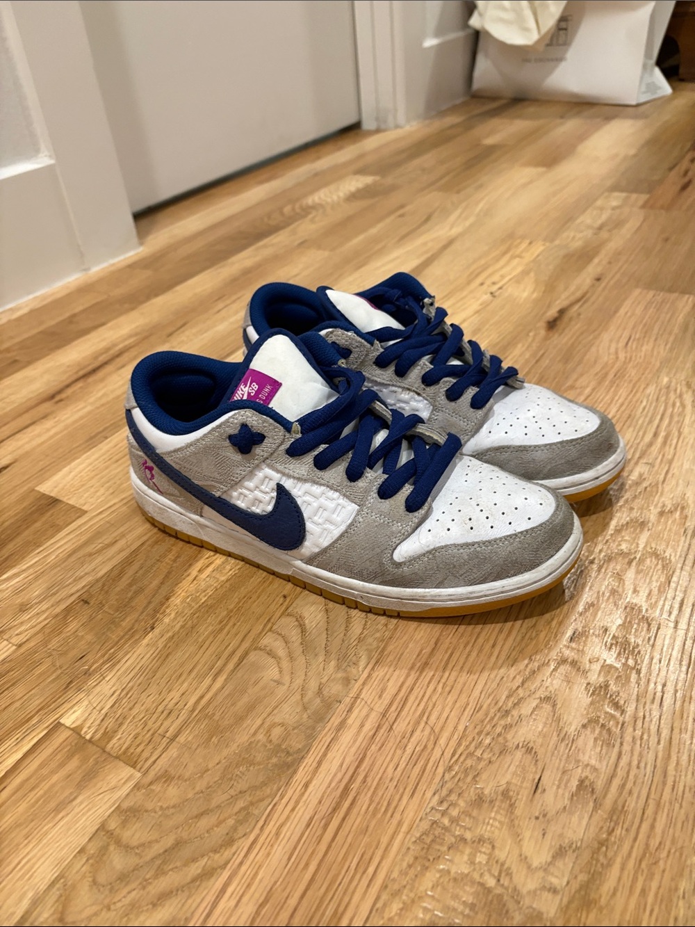 Nike Kids Low-Top Sneakers in White, Gray and Navy with Pink Accent